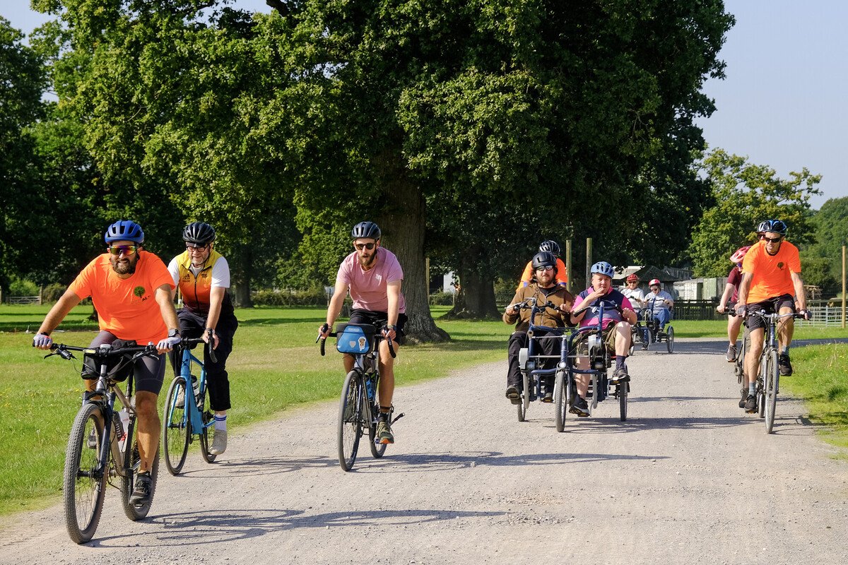 PEDALL Operational Lead Gareth Jones leads a group of cyclists on a wide track during Pass the PEDALL 2024